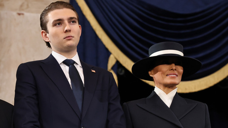 Barron and Melania Trump standing together