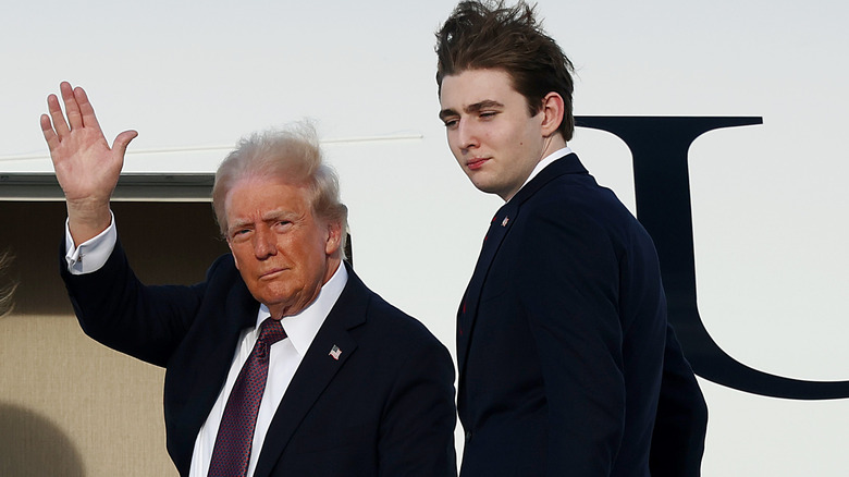 Donald and Barron Trump hair blowing in wind