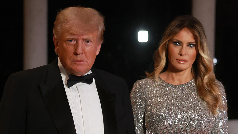 Donald Trump and Melania Trump posing at Mar-a-Lago