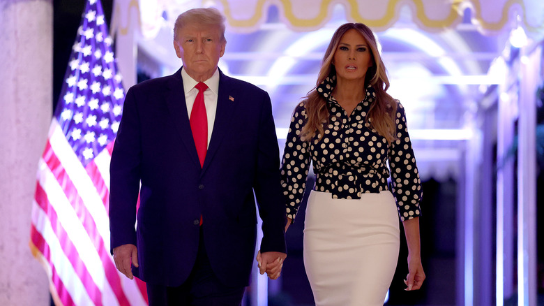 Donald Trump and Melania Trump looking intense