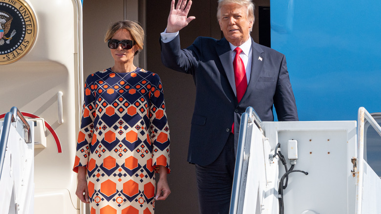 Melania and Donald Trump arrive in Florida after exiting the White House