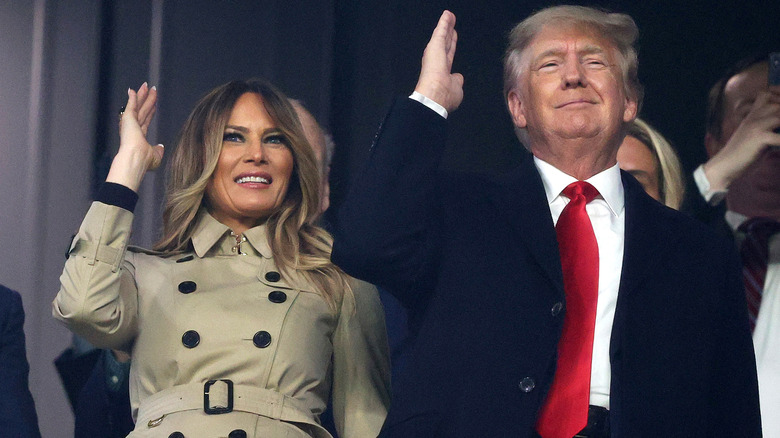 Melania Trump and Donald Trump waving awkwardly