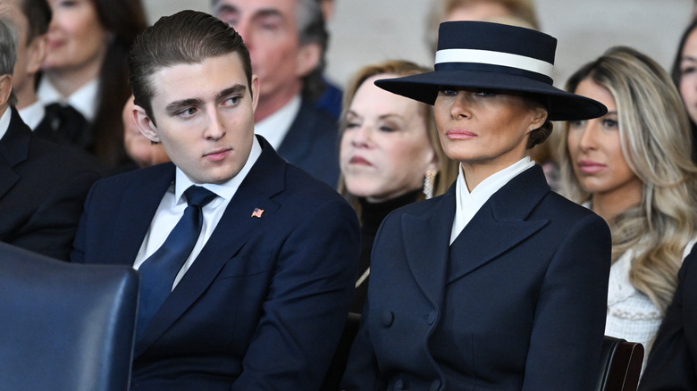 Barron Trump looking at Melania Trump