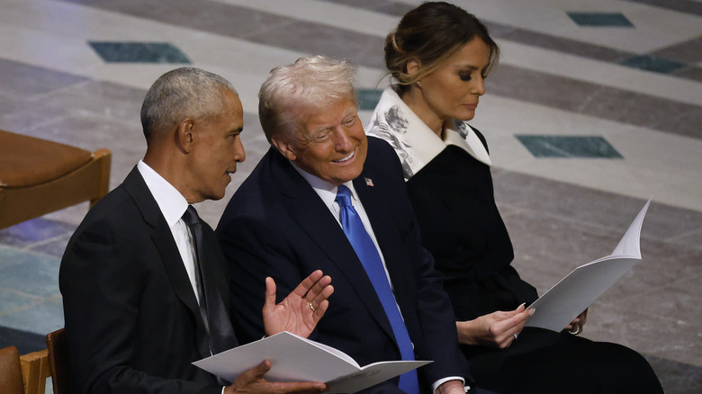 Melania Trump reading at Jimmy Carter's funeral while Donald Trump talks to Barack Obama