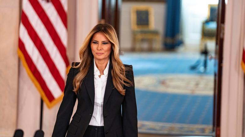 Melania Trump walking in the White House in 2025