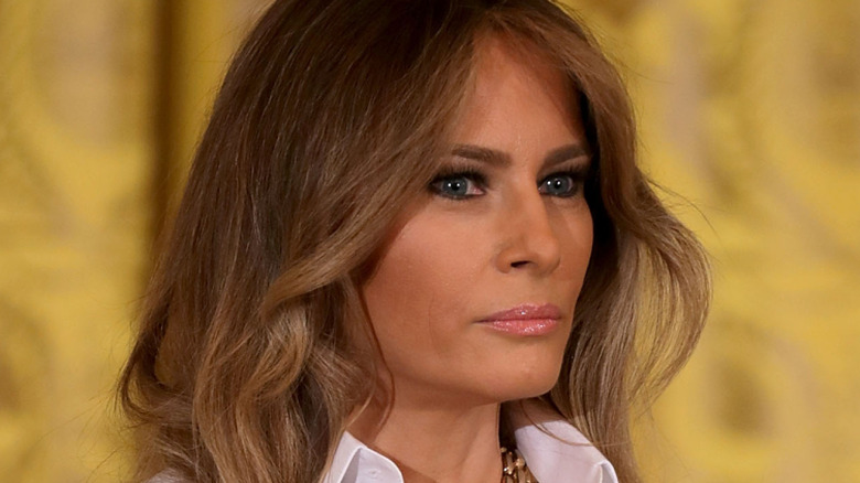 Melania Trump with wavy light brown hair