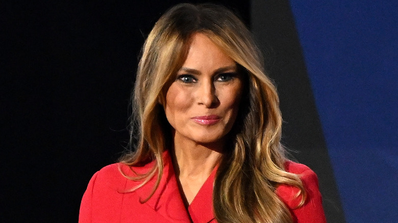 Melania Trump wearing red suit