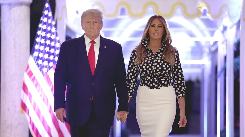 Donald and Melania Trump walking 