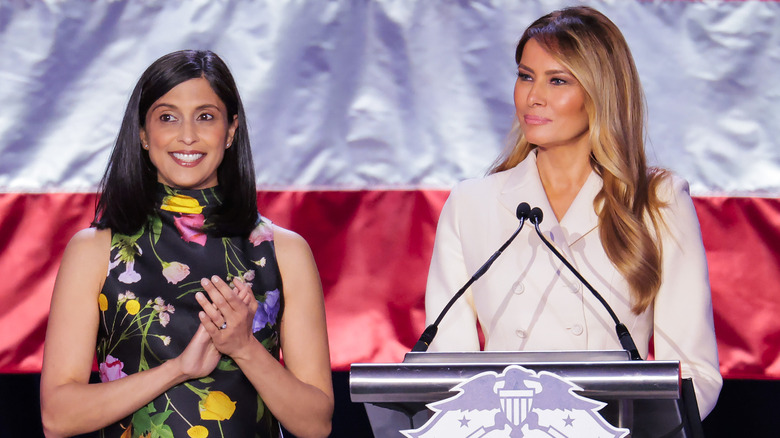 Usha Vance and Melania Trump smiling but looking in different directions