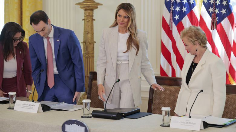 Melania Trump in a white suit at the White House