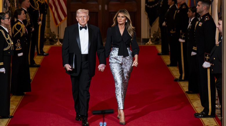 Donald and Melania Trump walking into 2026 Governors Dinner