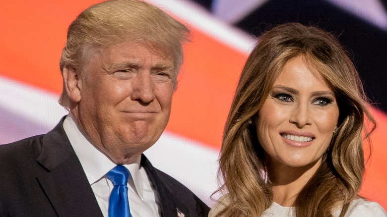 Donald Trump and Melania Trump posing together at an event