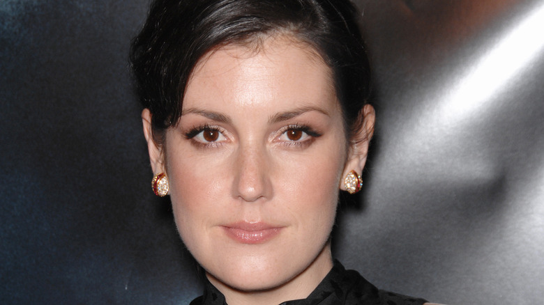 Melanie Lynskey with hair up and wearing earrings