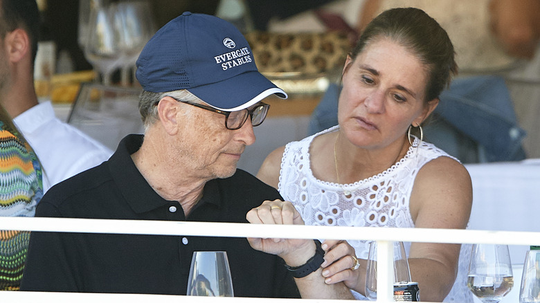 Melinda Gates checks Bill Gates' watch