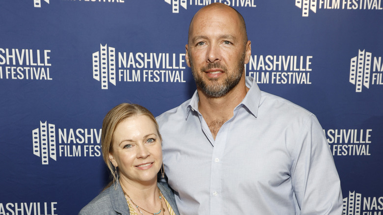Melissa Joan Hart and Mark Wilkerson attend the screening of "Unexpected" at Franklin Theatre on October 2, 2022 in Franklin, Tennessee (2022)