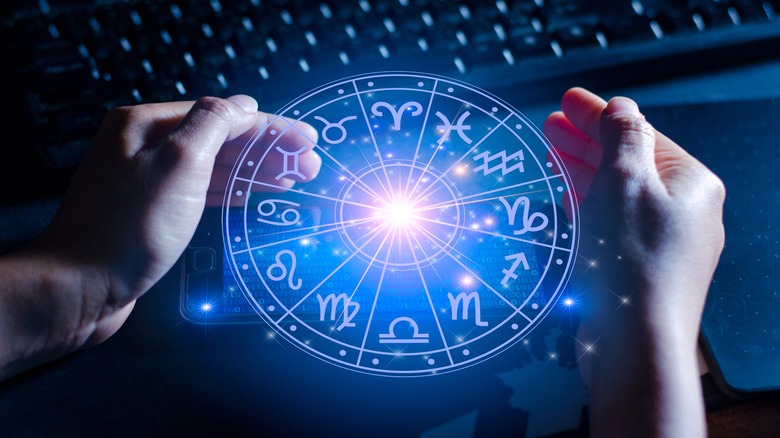 Zodiac wheel with hands