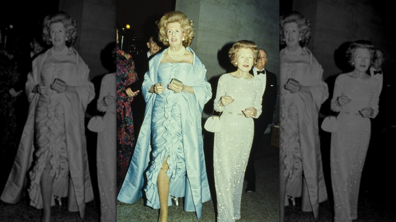 Philanthropist Audrey Zauderer in a blue Bill Blass gown and coat next to an unidentified woman at the 1979 Met Gala