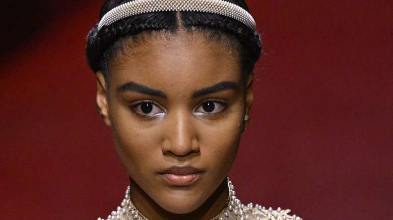 Dior model at Paris Fashion Week wearing metallic silver eyeshadow in inner corner