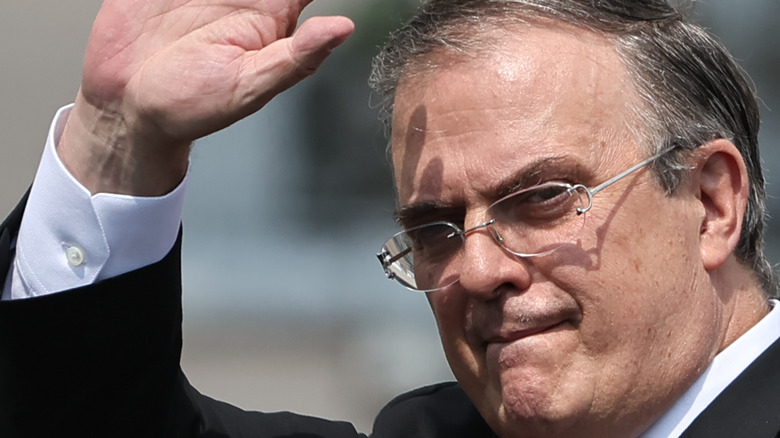 Marcelo Ebrard waving at camera in Mexico City