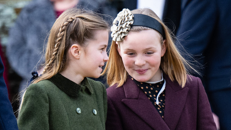 Mia and Charlotte walk together