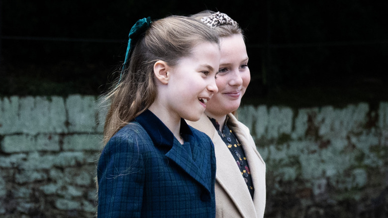 Mia and Charlotte walk together