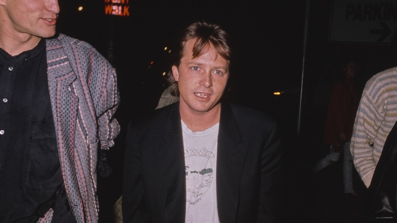 Michael J. Fox leaving a club in 1990