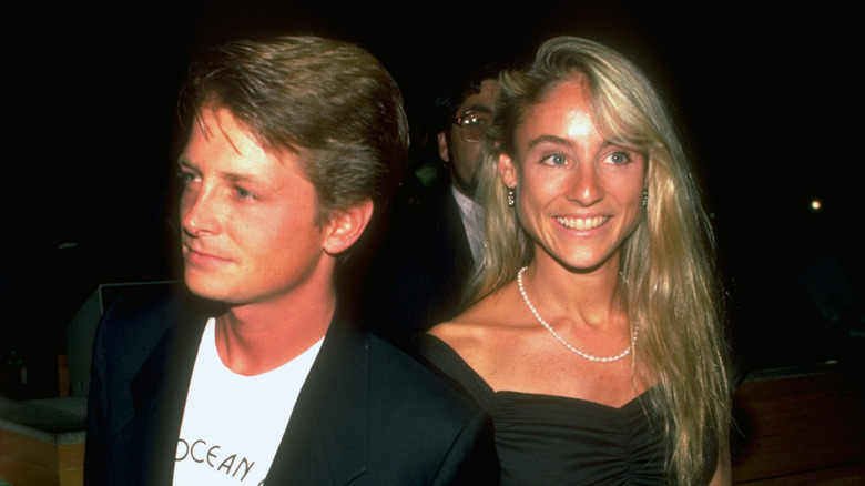 Michael J. Fox and Tracy Pollan walking together
