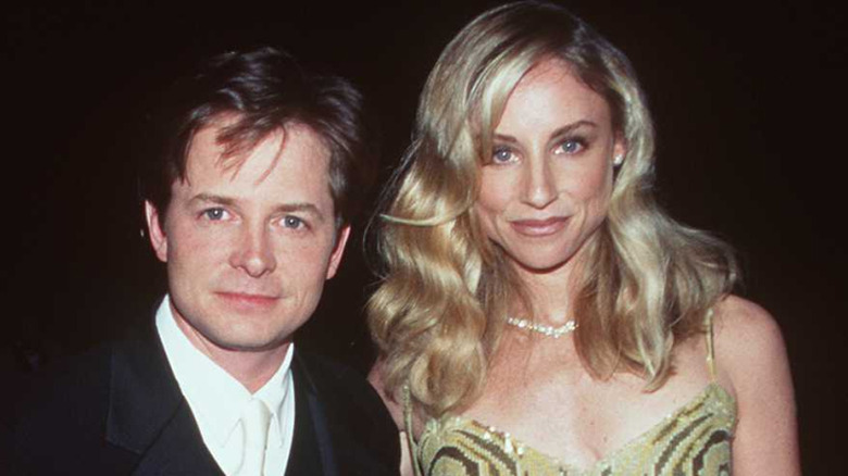 Michael J. Fox and Tracy Pollan posing for a photo
