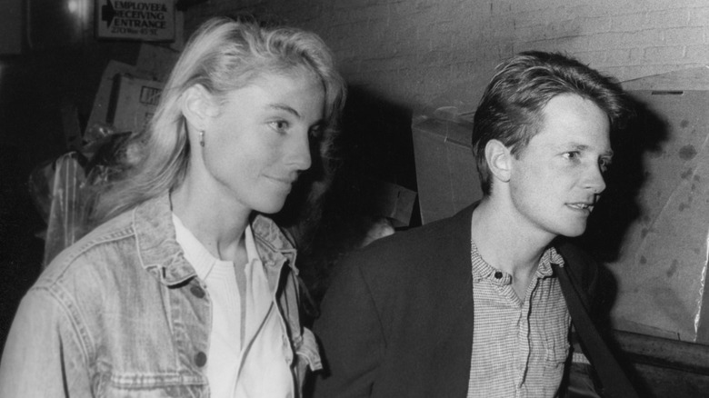 Michael J. Fox and Tracy Pollan walking together