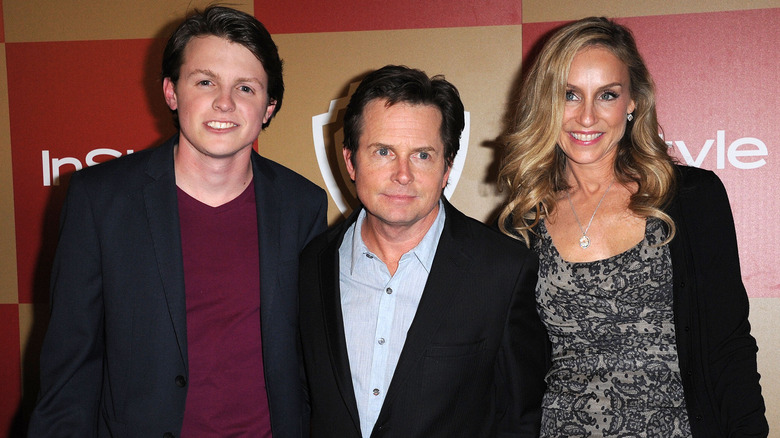 Sam Fox, Michael J. Fox, and Tracy Pollan at party