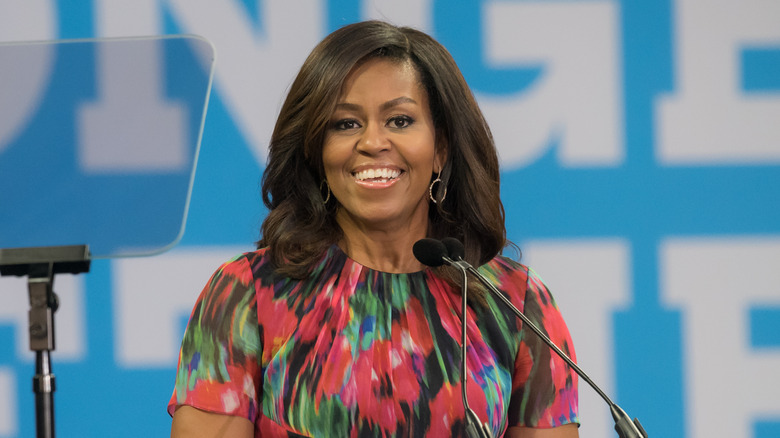 Michelle Obama speaking at a podium