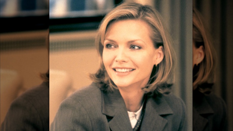 Michelle Pfeiffer in gray blazer with short bobbed hair