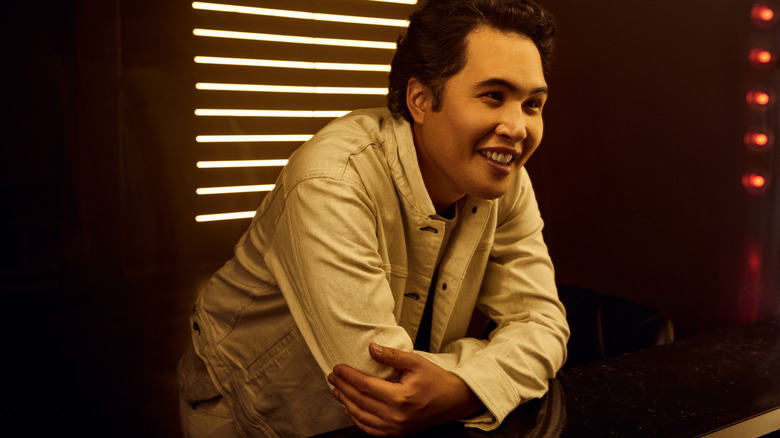 Mike Cabellon smiling at desk