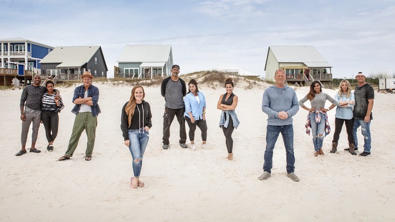 The cast of Battle on the Beach posing