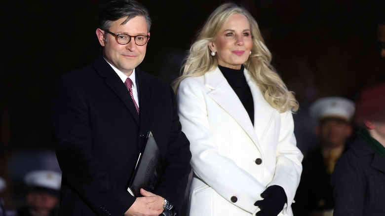 Speaker of the House Mike Johnson (R-LA) (L) and his wife Kelly Johnson attend the lighting of the U.S. Capitol Christmas Tree on the West Front of the U.S. Capitol on November 28, 2023 in Washington, DC.