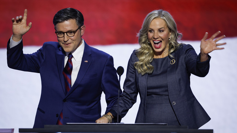 Speaker of the House Mike Johnson (R-LA) and his wife, Kelly Johnson, appear on stage on the second day of the Republican National Convention at the Fiserv Forum on July 16, 2024 in Milwaukee, Wisconsin.