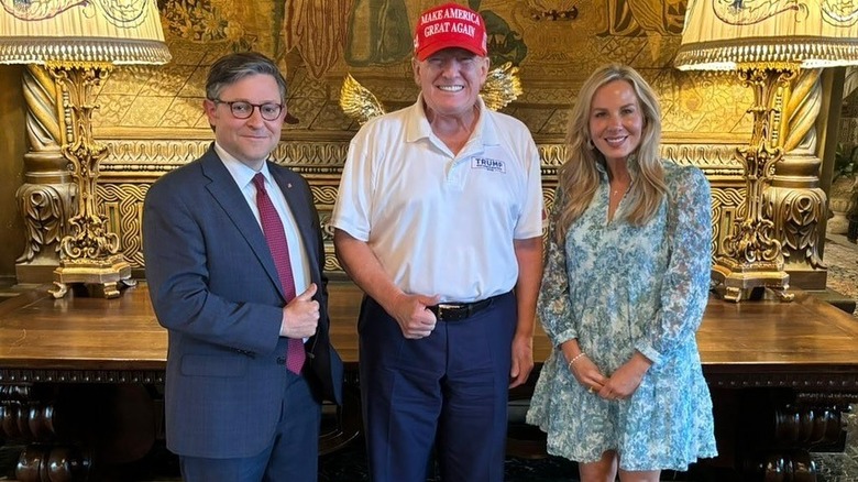 Speaker Mike Johnson, Donald Trump, and Kelly Johnson.