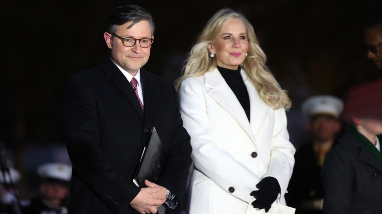 Mike and Kelly Johnson standing together