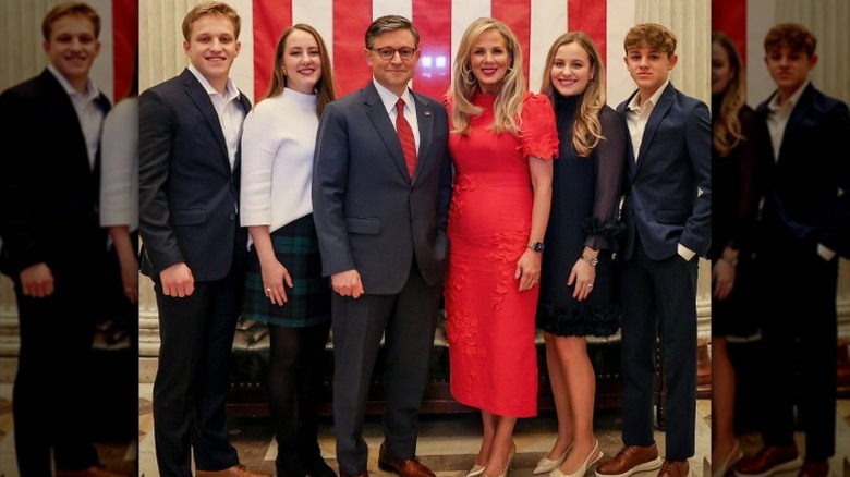 Mike Johnson, Kelly Johnson, and their children pose for a photo (2025)