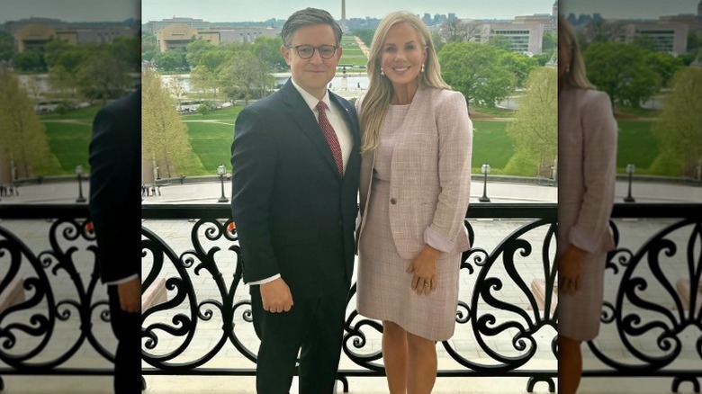 Mike Johnson and Kelly Johnson pose together in Washington, DC (2024)