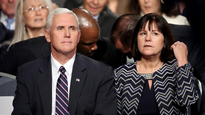 Mike Pence and Karen Pence looking stern
