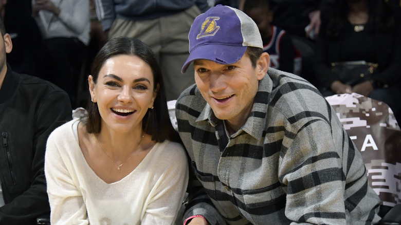 Ashton Kutcher and Mila Kunis smiling