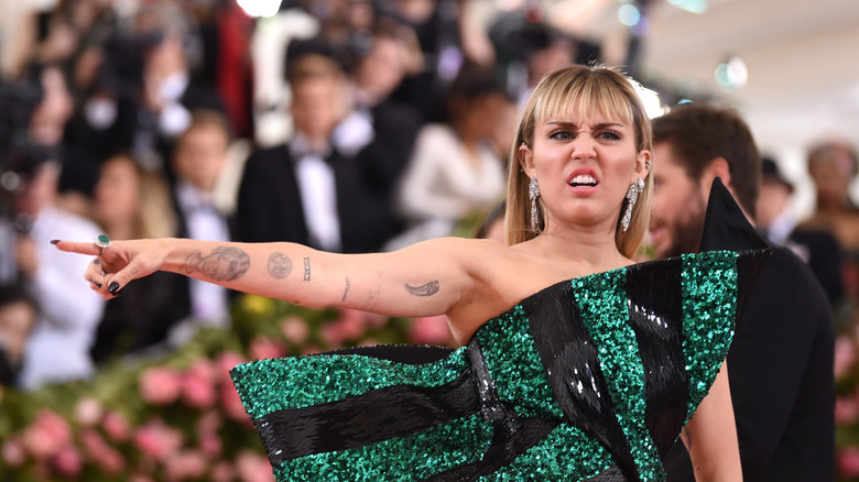 Miley Cyrus pointing