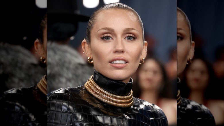 Miley Cyrus smiling at Met Gala 2025