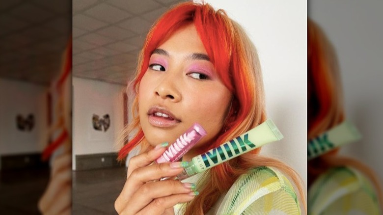 influencer holding Milk Makeup bionic blushes