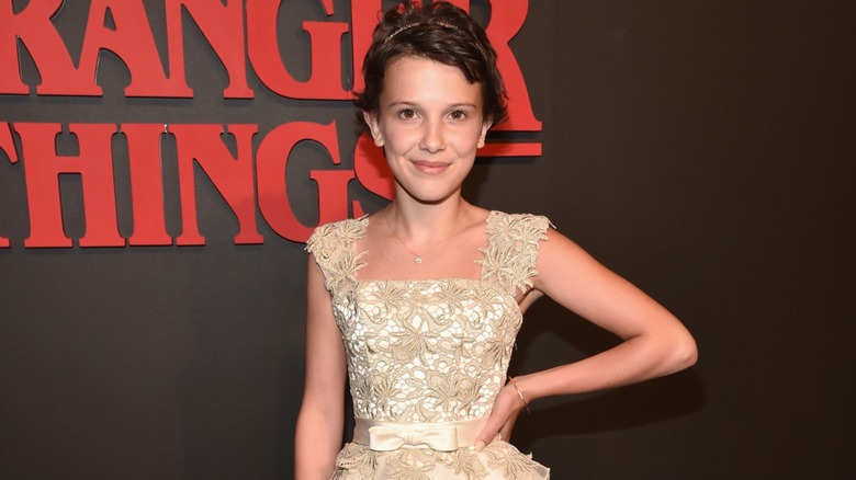 Millie Bobby Brown posing at "Stranger Things" premiere