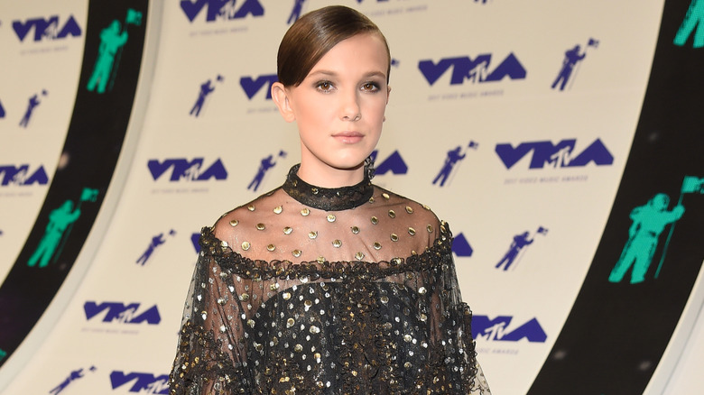 Millie Bobby Brown at the 2017 MTV Video Music Awards wearing black dress