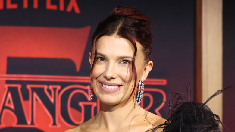 Millie Bobby Brown attends Netflix's "Stranger Things" Season 5 World Premiere at TCL Chinese 6 Theatres on November 6, 2025 in Hollywood, California (2025)
