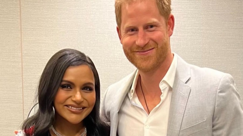 Mindy Kaling and Prince Harry smiling