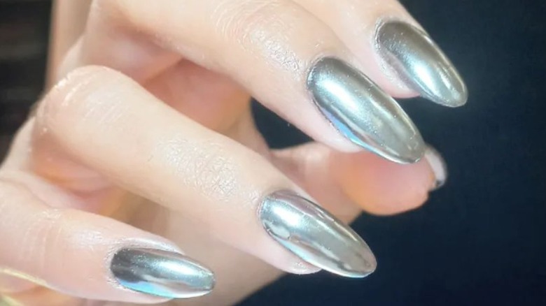 Close-up of silver mirrored nails